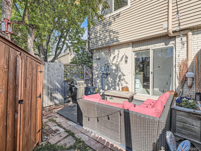 4273 W Ponds Cir, Littleton, CO 80123 - wooden deck featuring fence, a grill, and a gate