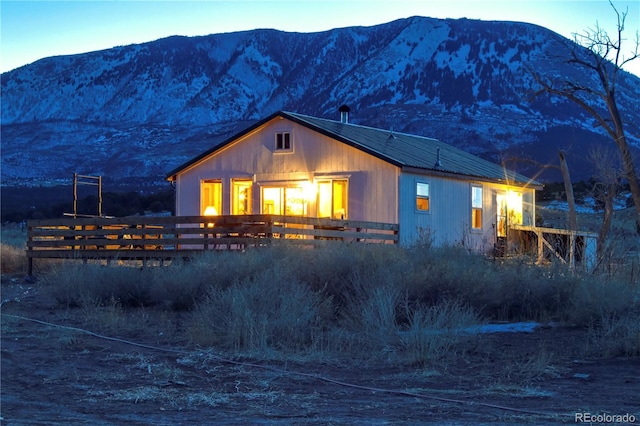 exterior space featuring a mountain view