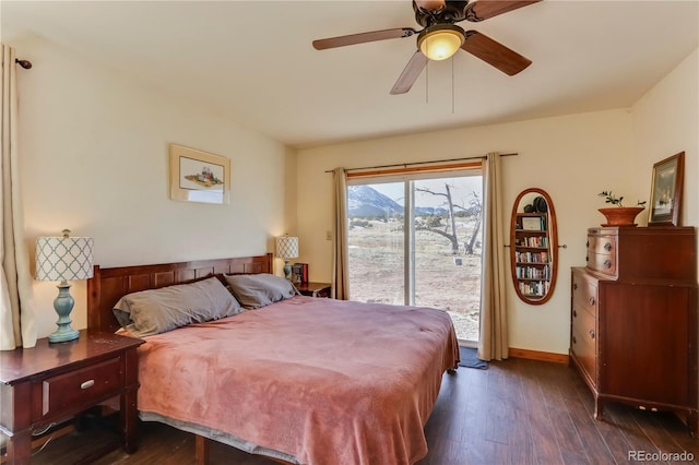 bedroom featuring ceiling fan, dark wood-type flooring, and access to outside