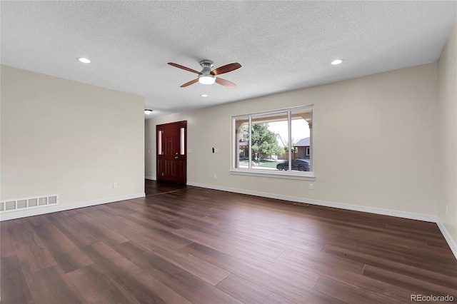 3653 E 133rd Ct, Thornton, CO 80241 - spare room with ceiling fan, dark wood-style flooring, a textured ceiling, baseboards, and recessed lighting