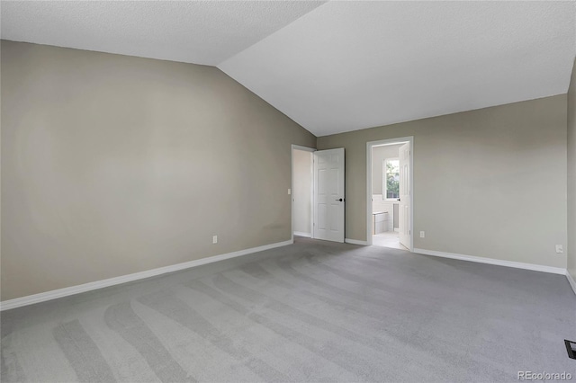 3653 E 133rd Ct, Thornton, CO 80241 - empty room with lofted ceiling, baseboards, and carpet flooring
