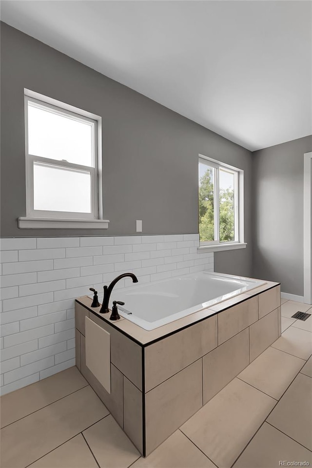 3653 E 133rd Ct, Thornton, CO 80241 - full bathroom with tile patterned flooring and a garden tub