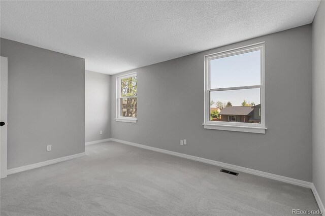 3653 E 133rd Ct, Thornton, CO 80241 - unfurnished room with carpet flooring, baseboards, and a textured ceiling