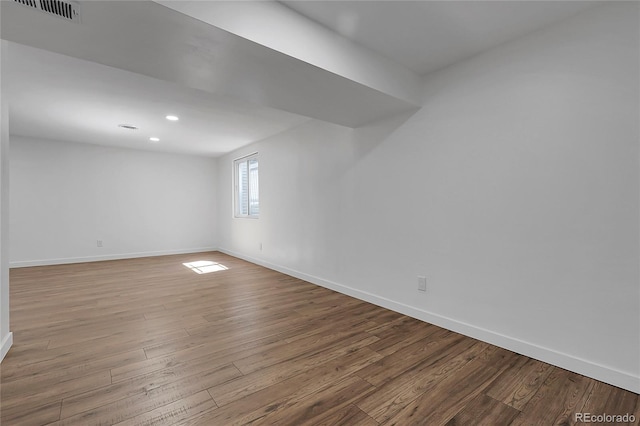 3653 E 133rd Ct, Thornton, CO 80241 - empty room with wood finished floors, baseboards, and recessed lighting