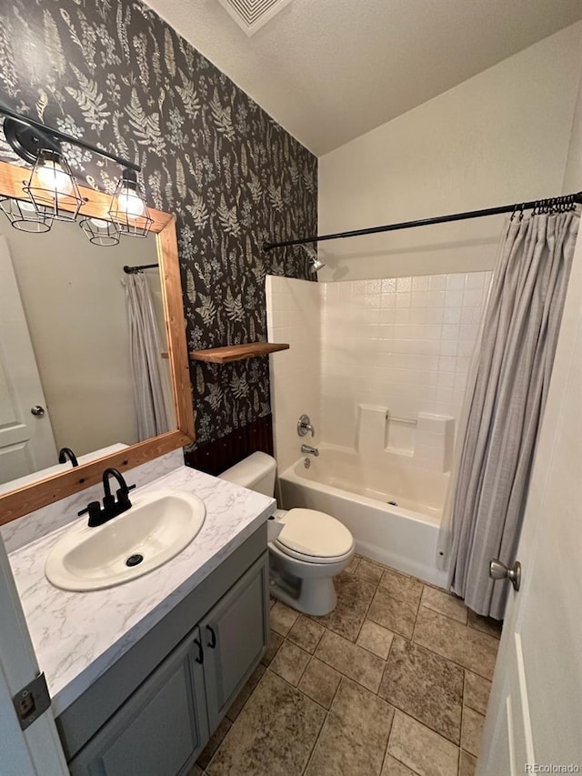 1326 Kaufman Rd, Hartsel, CO 80449 - bathroom with wallpapered walls, vanity, shower / tub combo, and toilet