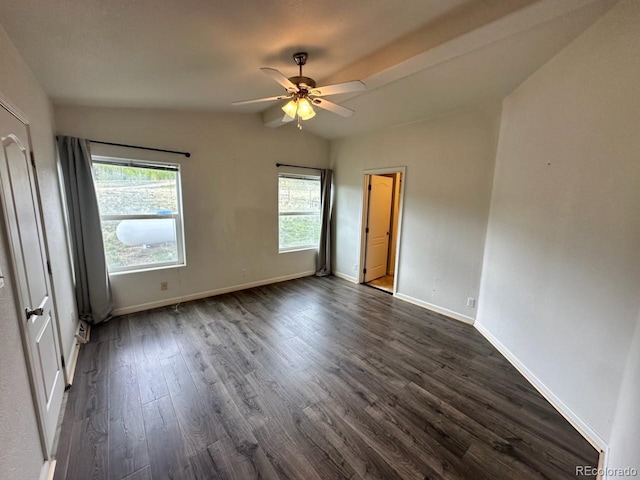 1326 Kaufman Rd, Hartsel, CO 80449 - unfurnished bedroom featuring vaulted ceiling, dark wood-type flooring, baseboards, and ceiling fan