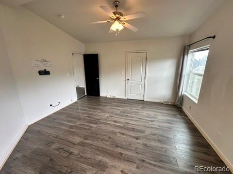 1326 Kaufman Rd, Hartsel, CO 80449 - unfurnished bedroom with wood finished floors, baseboards, and a ceiling fan