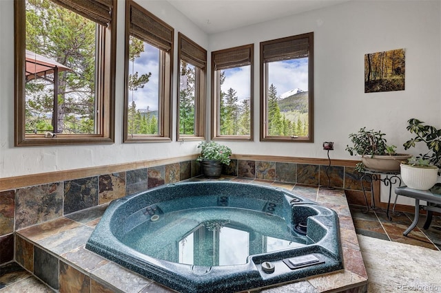 322 Davis Ct, Breckenridge, CO 80424 - misc room featuring stone tile floors and a jacuzzi