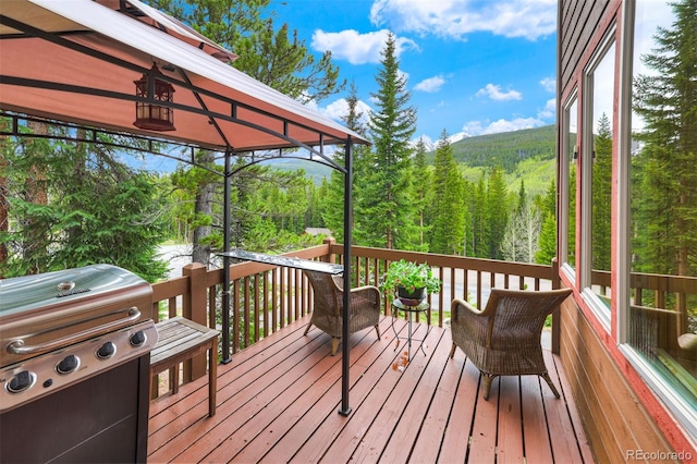 322 Davis Ct, Breckenridge, CO 80424 - wooden terrace with a grill, a forest view, and a gazebo