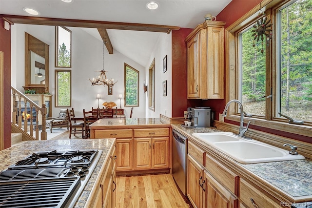 322 Davis Ct, Breckenridge, CO 80424 - kitchen with stainless steel dishwasher, gas cooktop, a chandelier, light wood-style flooring, and recessed lighting