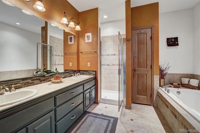 322 Davis Ct, Breckenridge, CO 80424 - full bath featuring a shower stall, double vanity, a bath, tile patterned flooring, and recessed lighting