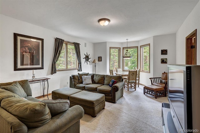 322 Davis Ct, Breckenridge, CO 80424 - living area with healthy amount of natural light and light carpet