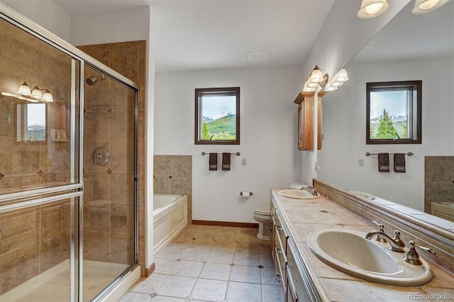 322 Davis Ct, Breckenridge, CO 80424 - bathroom featuring a bath, double vanity, tile patterned floors, and a stall shower