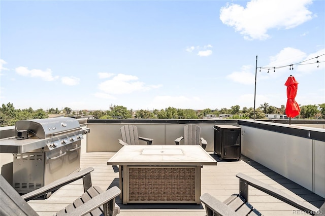 wooden deck featuring grilling area