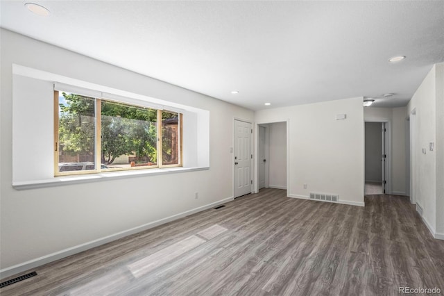 1035 Iris St, Broomfield, CO 80020 - unfurnished living room featuring wood finished floors and recessed lighting