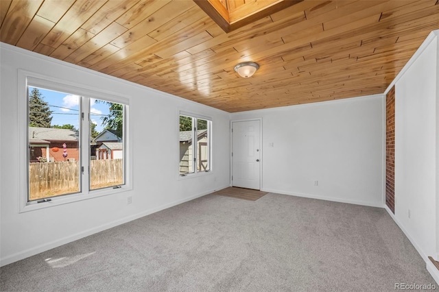 1035 Iris St, Broomfield, CO 80020 - carpeted spare room featuring wood ceiling and baseboards
