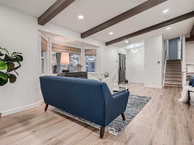 8916 Sunridge Hollow Rd, Parker, CO 80134 - living area with stairs, baseboards, beam ceiling, and light wood-type flooring