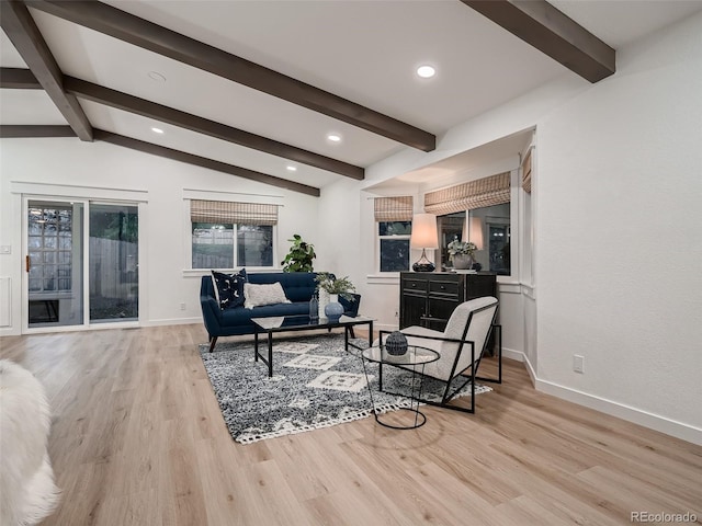 8916 Sunridge Hollow Rd, Parker, CO 80134 - living room featuring recessed lighting, baseboards, vaulted ceiling with beams, and light wood-type flooring