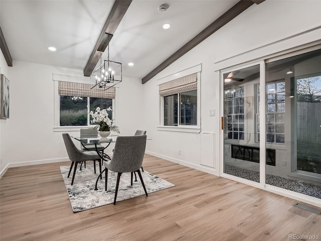 8916 Sunridge Hollow Rd, Parker, CO 80134 - dining space with a notable chandelier, lofted ceiling with beams, recessed lighting, baseboards, and wood finished floors