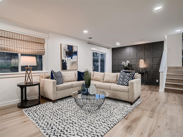 8916 Sunridge Hollow Rd, Parker, CO 80134 - living room with stairs, recessed lighting, baseboards, wood finished floors, and visible vents