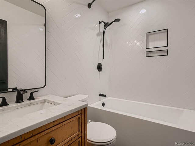 8916 Sunridge Hollow Rd, Parker, CO 80134 - full bath with vanity, toilet, tile walls, and tub / shower combination