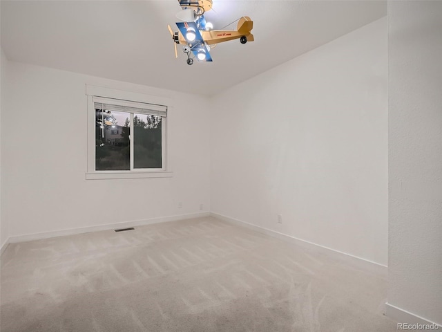 8916 Sunridge Hollow Rd, Parker, CO 80134 - carpeted empty room with visible vents and baseboards