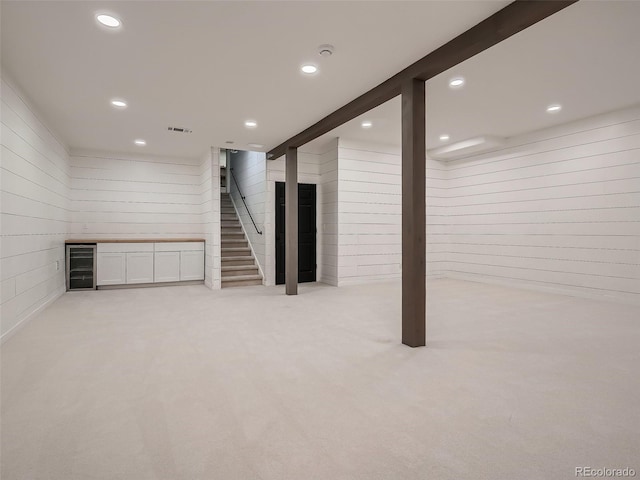 8916 Sunridge Hollow Rd, Parker, CO 80134 - finished basement featuring recessed lighting, stairs, visible vents, and light carpet