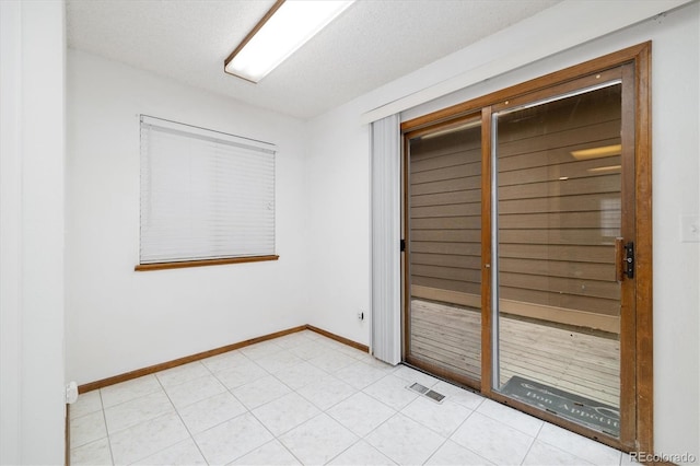 1770 S Quintero Way, Aurora, CO 80017 - unfurnished bedroom featuring baseboards, visible vents, and a closet