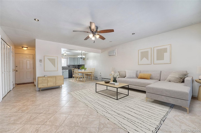 living area with recessed lighting and ceiling fan with notable chandelier