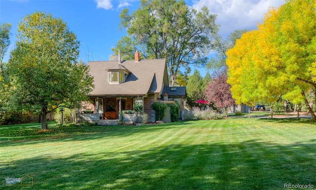 3737 26th St, Boulder, CO 80304 - view of front of property featuring covered porch, a front yard, and a chimney