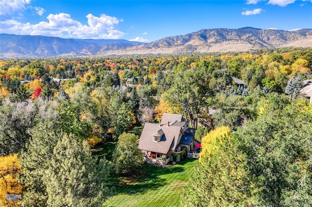 3737 26th St, Boulder, CO 80304 - view from above of property with a heavily wooded area and a mountain backdrop