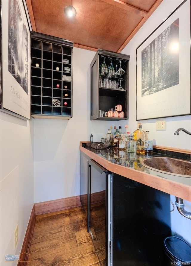 3737 26th St, Boulder, CO 80304 - indoor wet bar featuring wood finished floors and baseboards