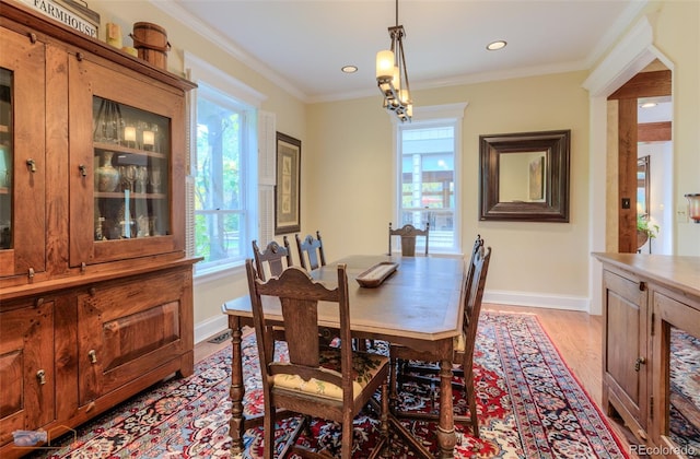 3737 26th St, Boulder, CO 80304 - dining room with light wood-type flooring, ornamental molding, and recessed lighting