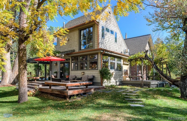 3737 26th St, Boulder, CO 80304 - rear view of property with a deck, a yard, and a shingled roof