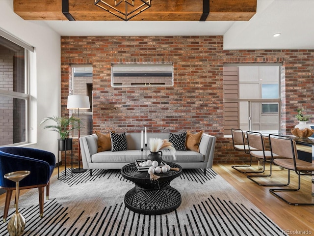 8336 E 35th Ave, Denver, CO 80238 - living room with brick wall, wood finished floors, and beamed ceiling