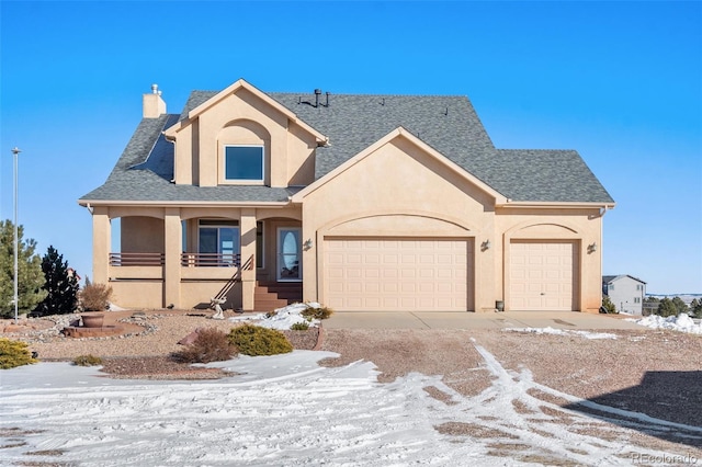 view of front of property featuring a garage