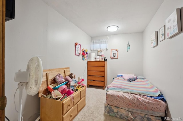 bedroom featuring light colored carpet