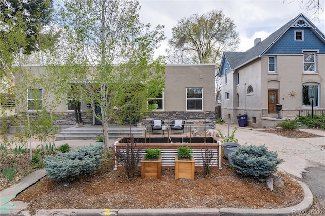 view of home's community with a wooden deck