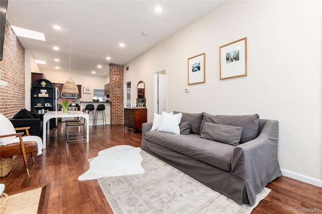 living room featuring baseboards, recessed lighting, and dark wood-type flooring