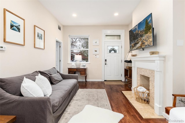 3220 W 24th Ave, Denver, CO 80211 - living area with recessed lighting, visible vents, a fireplace, and dark wood-style floors