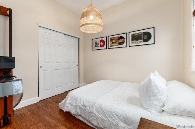 3220 W 24th Ave, Denver, CO 80211 - bedroom with wood finished floors and a closet