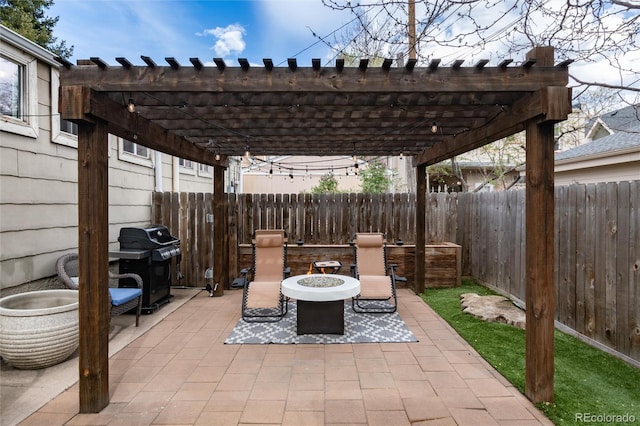 3220 W 24th Ave, Denver, CO 80211 - fenced backyard with a grill, a fire pit, a patio area, and a pergola