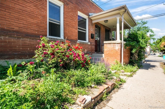 22 E Bayaud Ave, Denver, CO 80209 - doorway to property with brick siding