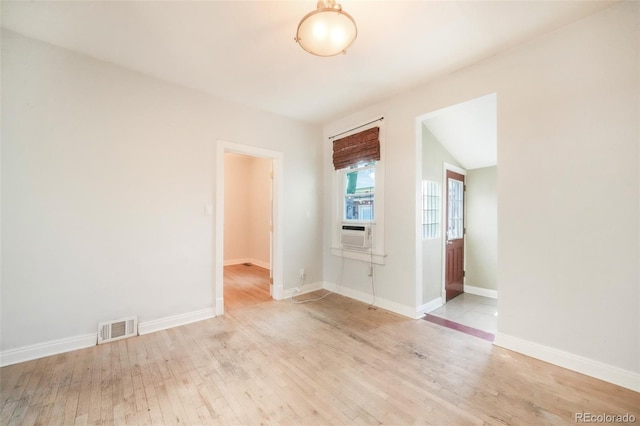 22 E Bayaud Ave, Denver, CO 80209 - unfurnished room with wood finished floors and cooling unit