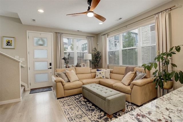 9279 Merino Ct Unit D, Littleton, CO 80125 - living area featuring a ceiling fan, light wood-style floors, baseboards, and recessed lighting