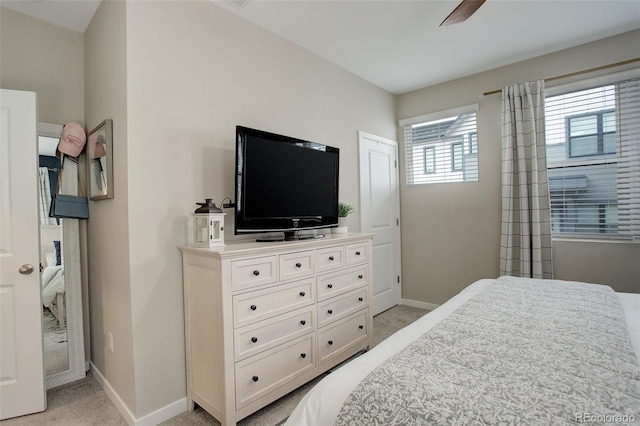 9279 Merino Ct Unit D, Littleton, CO 80125 - bedroom with light colored carpet and baseboards