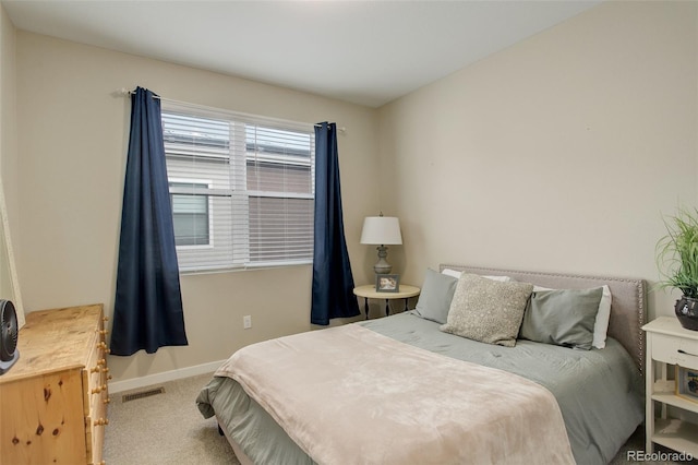 9279 Merino Ct Unit D, Littleton, CO 80125 - carpeted bedroom featuring baseboards