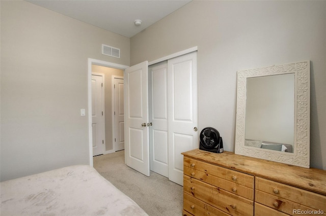 9279 Merino Ct Unit D, Littleton, CO 80125 - bedroom with light carpet and a closet