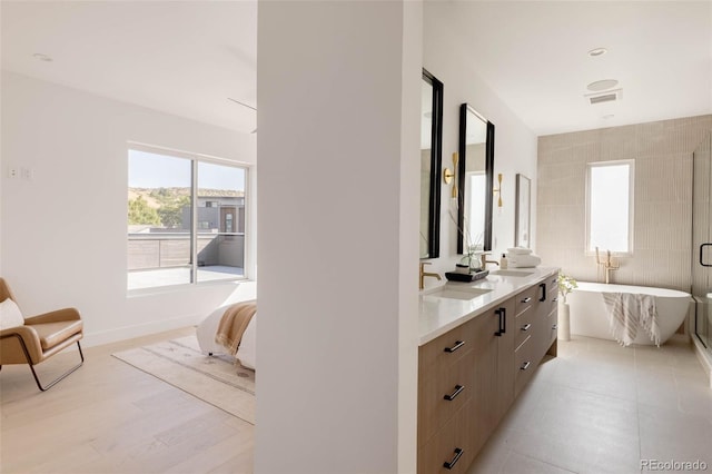 16133 W 14th Ave, Golden, CO 80401 - bathroom featuring vanity and a bathing tub