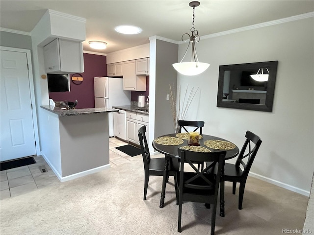 4676 White Rock Cir Unit 12, Boulder, CO 80301 - dining space featuring ornamental molding and light colored carpet